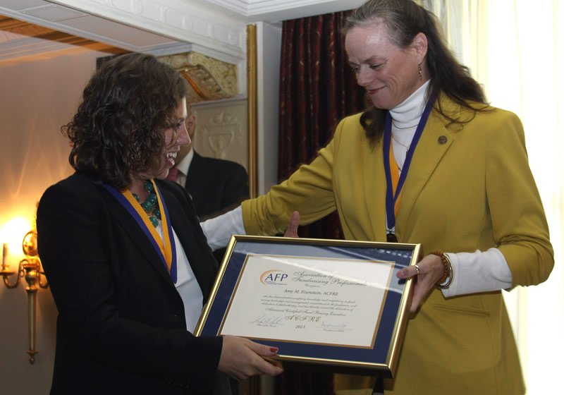 Amy being presented her ACFRE certificate